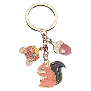 Thanksgiving keychain with rose gold squirrel acorn and vegetable cart charms