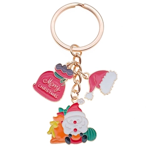 Portachiavi creativo Babbo Natale e sacchetto regalo dorato con smalto rosso acceso