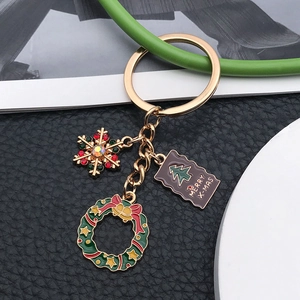 Porte-clés de Noël avec flocon de neige et pendentif couronne Merry X-Mas en or