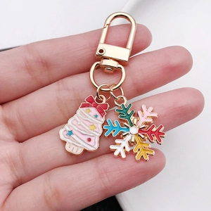Pink Christmas tree and colorful snowflake keychain with golden clasp for bags