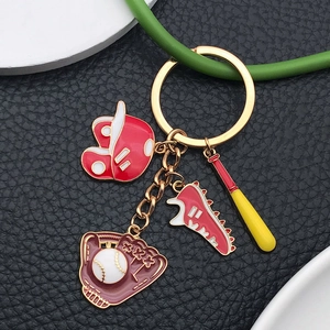 Creative red baseball theme keychain with helmet, sneaker and bat charms on leather