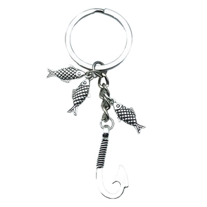 Antique silver fishing keychain with three small fish charms and a large hook pendant