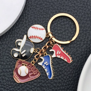 Detail of baseball keychain with mini glove, ball, and red blue enamel shoes