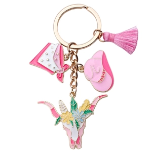 Porte-clés chapeau de cowboy rose et crâne de taureau fleuri avec franges