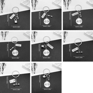 Set of 8 fitness theme stainless steel keychains with barbell and kettlebell charms