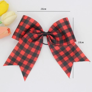 Detailed view of large 18cm red and black buffalo plaid ribbon bow with elastic band