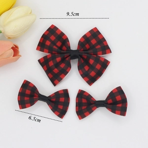 Detail view of red and black buffalo plaid ribbon bows with size measurements in centimeters