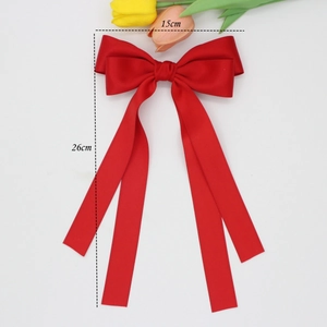 Grande barrette à nœud en satin rouge avec de longs rubans mesurant 15cm sur 26cm
