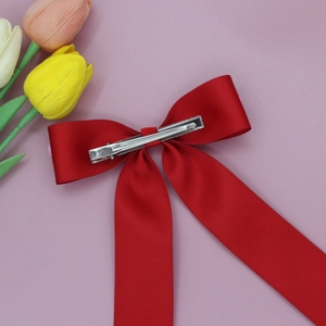 Red satin bow hair clip with long ribbons and metal alligator clip for women