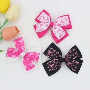 Tre fiocchi per capelli fatti a mano in nastro a coste con motivi a nastro rosa