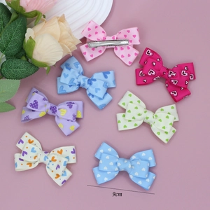 Lot de 7 nœuds à cheveux 9cm en ruban gros-grain avec motifs cœurs pour filles