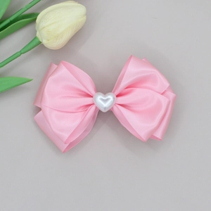 Pink satin bow hair clip with heart pearl centerpiece for girls hair accessories