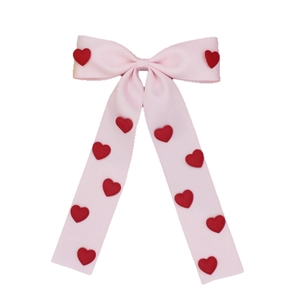 Pink satin bow hair clip with red hearts and long ribbons for sweet Valentine styling