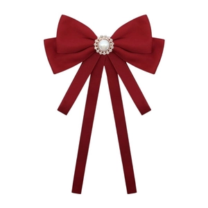 Elegant deep red satin bow brooch featuring a central pearl and sparkling rhinestones