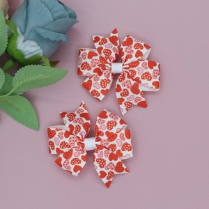 Paio di fiocchi per capelli in nastro grosgrain con cuori rossi per San Valentino