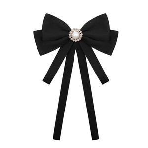 Elegant black bow brooch with a pearl sunflower center and long fabric ribbons