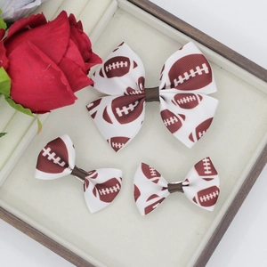 Set van 3 geribbelde haarstrikken met American football print in bruin en wit