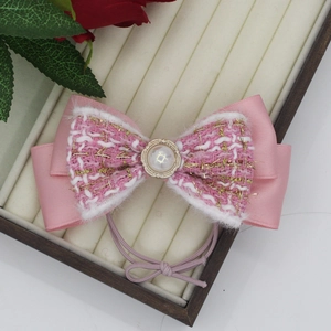 Fiocco per capelli in tweed rosa con perla e fascia elastica ad alta resistenza