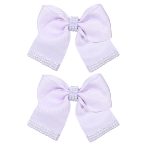 Barrettes lavande avec perles blanches et texture nervurée pour cheveux de fille