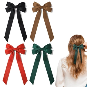 Elegant large ribbon bow hair clips set for girls featuring four classic colors with streamers