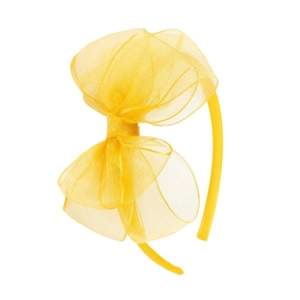 Gros plan du serre-tête à gros nœud en organza jaune vif avec texture en maille