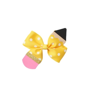 Polka dot yellow pencil shape hair bow with pink glitter eraser and black pencil tip