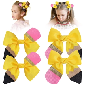 Creative pencil bow hair clips for girls featuring yellow ribbed ribbon and school theme