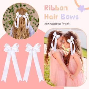 Set of two white satin ribbon hair bows with long streamers for girls' hair styling