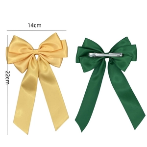 Set of two large 14cm satin bow hair clips in golden and dark green silky fabric