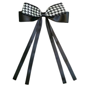 Houndstooth pattern and black satin ribbon bow hair clip with elegant long streamers