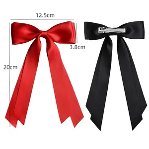 Large satin bow hair clips in red and black, double-layered ballet style for girls