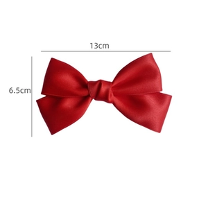 Elegante fermaglio per capelli con fiocco in raso rosso e finitura setosa 13cm x 6,5cm