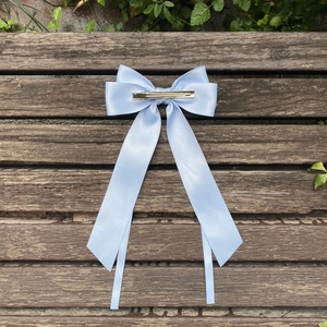 Sweet light blue satin ribbon bow hair clip with long streamers for elegant women's hairstyle