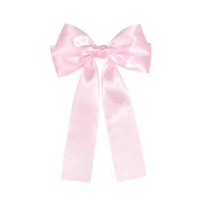 Detail view of pink satin bow hairclip showing smooth silk texture and long ribbon tails