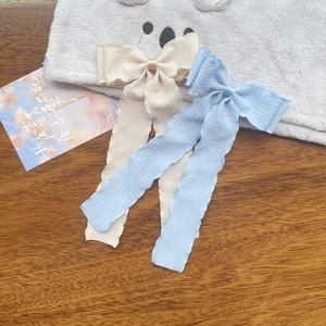 Pleated chiffon ribbon bow hair clips in light blue and beige for women's hair styling