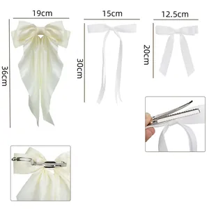 Set of 6 white satin bow hair clips for girls with size measurements and back clip details