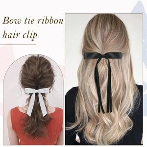 Elegant satin bow hair clips with long ribbons in black and white for women's hairstyles
