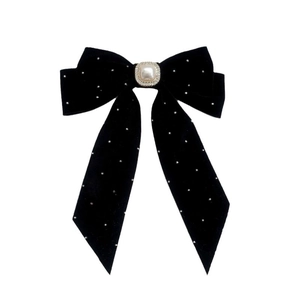 Elegant black velvet ribbon bow hair clip with a large pearl and sparkling rhinestones