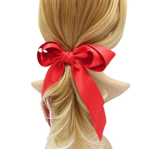 Elegante fermaglio per capelli rosso con fiocco in raso e lunghi nastri fluidi
