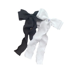 Pleated fishtail ribbon bow hair clip with streamers in classic black and white colors