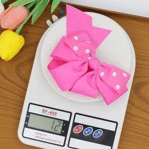 Leggera clip per capelli con fiocco rosa a pois per donna che pesa solo 12 grammi