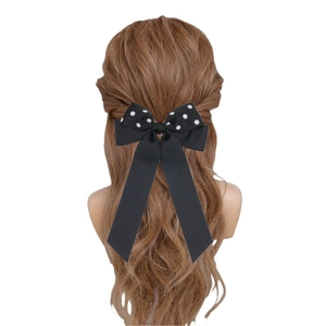 Fermaglio per capelli a fiocco nero con pois bianchi e lunghi nastri per acconciature