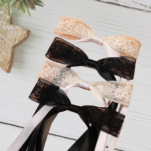 Set mit Spitzen-Haarschleifen in Schwarz und Beige für elegante Mädchenfrisuren