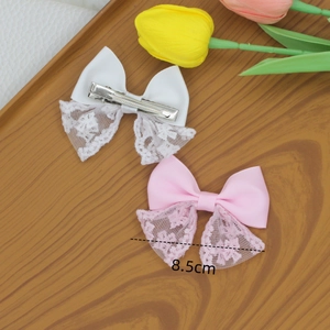 Sweet pink and white lace bow hair clips for girls featuring a metal crocodile grip