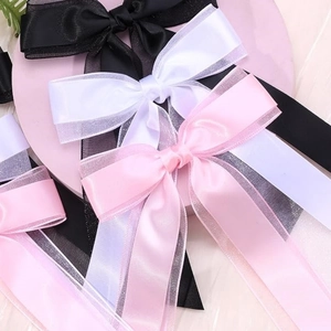 Elegant layered satin organza bow hair clips with long streamers in black, white, and pink