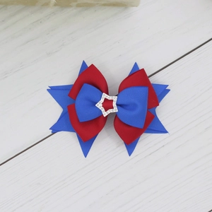 Fermaglio per capelli a fiocco multistrato in gros-grain con stella di strass per bimbi