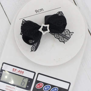 Fermaglio per capelli in pizzo nero con pendente a stella d'argento e strass 9cm