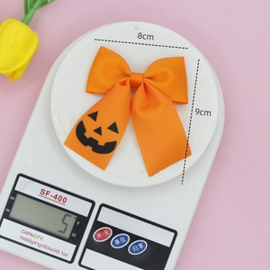 Nœud pour cheveux orange Halloween avec motif citrouille, taille 8x9cm, poids 5g