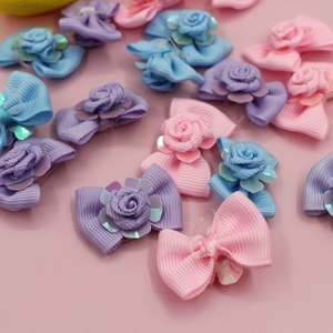 Set of 10 pastel ribbon hair bows with mini fabric roses and shiny sequins for girls