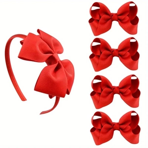 Détail d'un ensemble de 5 pièces comprenant un serre-tête en gros-grain rouge et barrettes